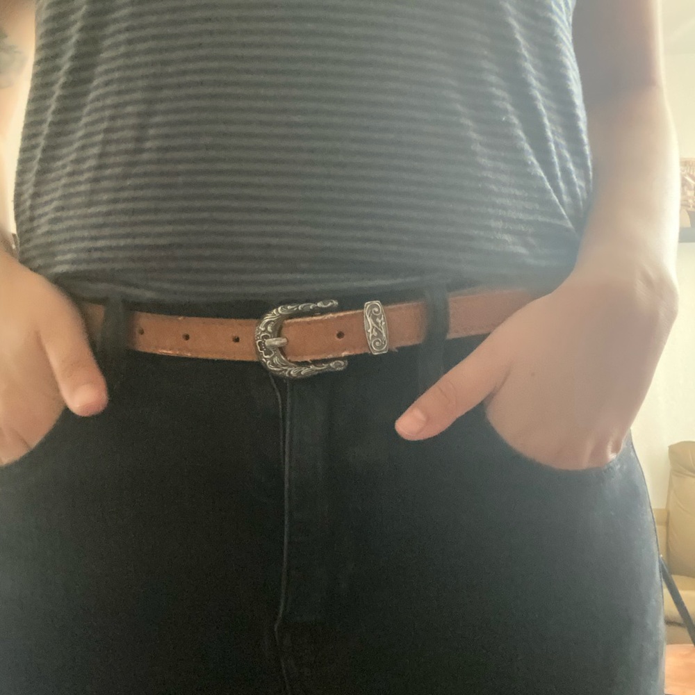 Light brown “leather” belt with silver clasp